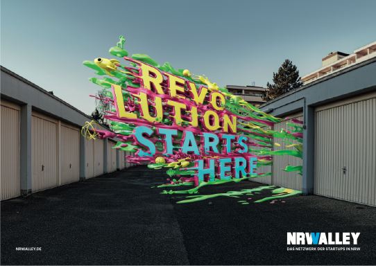NRWalley – Revolution starts here Slogan kommt aus Wand in bunt